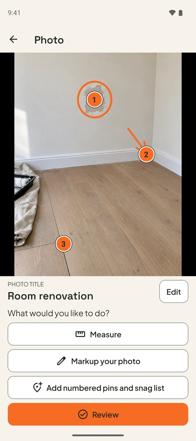 Room renovation photo with options to measure, mark up, add numbered pins or review