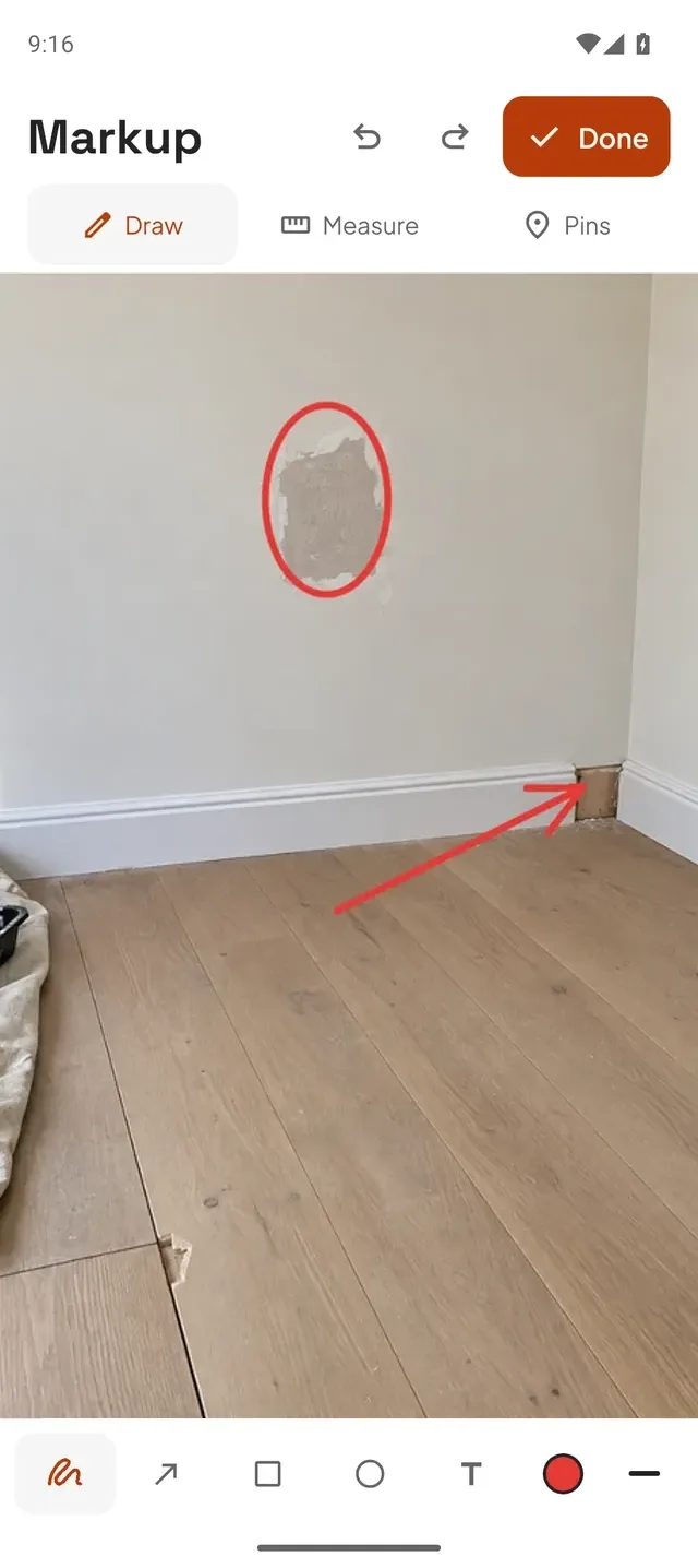 Drawpin markup screen: plaster patch circled in red and an arrow pointing to a gap in the skirting